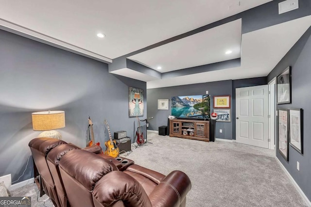 320 Ironhill Trce, Woodstock, GA 30189 - carpeted living area with baseboards, a tray ceiling, and recessed lighting