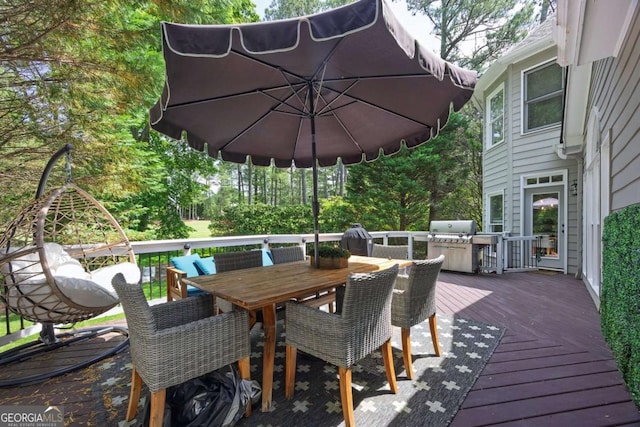 320 Ironhill Trce, Woodstock, GA 30189 - wooden deck with outdoor dining area and area for grilling