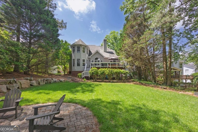 320 Ironhill Trce, Woodstock, GA 30189 - view of green lawn featuring a wooden deck, stairway, and a patio