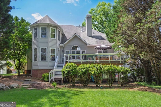 320 Ironhill Trce, Woodstock, GA 30189 - rear view of house featuring a deck, stairway, a chimney, and roof with shingles