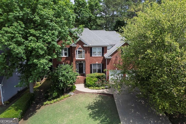 320 Ironhill Trce, Woodstock, GA 30189 - view of front of home featuring brick siding