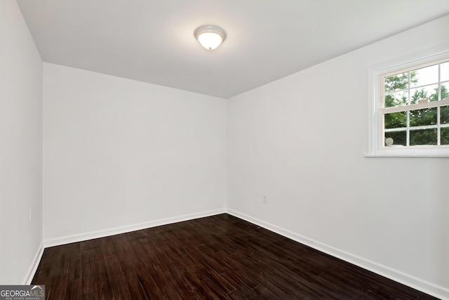 243 Mulkey Rd, Demorest, GA 30535 - empty room with dark wood-style floors and baseboards