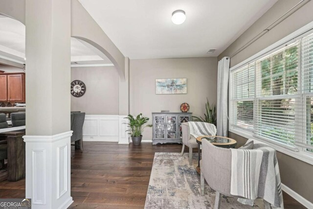 2910 Cross Creek Dr, Cumming, GA 30040 - dining room with arched walkways and wood finished floors