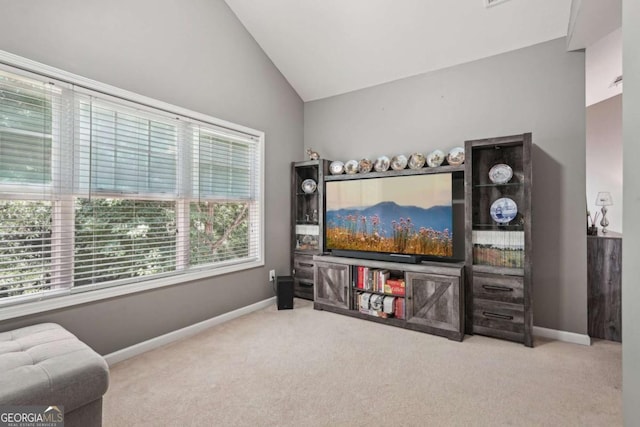2910 Cross Creek Dr, Cumming, GA 30040 - sitting room with carpet flooring, vaulted ceiling, and baseboards