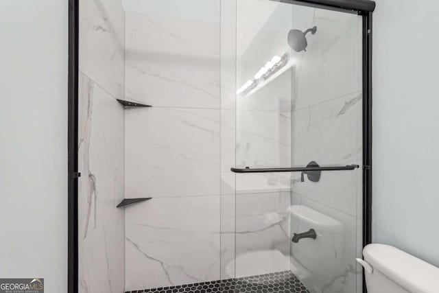 2910 Cross Creek Dr, Cumming, GA 30040 - bathroom featuring toilet and a marble finish shower