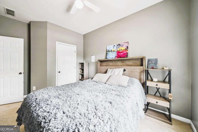 2910 Cross Creek Dr, Cumming, GA 30040 - bedroom with light colored carpet, baseboards, and a ceiling fan