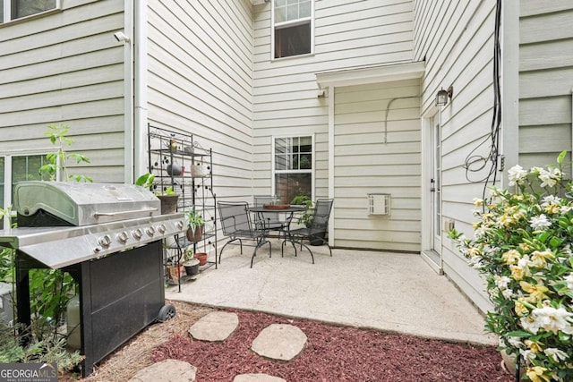 2910 Cross Creek Dr, Cumming, GA 30040 - view of patio / terrace featuring grilling area and outdoor dining space