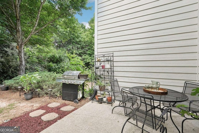 2910 Cross Creek Dr, Cumming, GA 30040 - view of patio featuring outdoor dining space and area for grilling