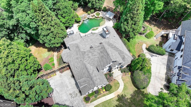 7920 Tintern Trce Unit 298, Duluth, GA 30097 - aerial view of property and surrounding area featuring a pool area
