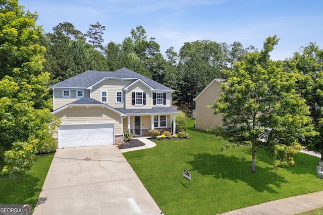 2840 Brookford Ln SW, South Fulton, GA 30331 - view of front of property featuring covered porch, stone siding, driveway, an attached garage, and a front lawn