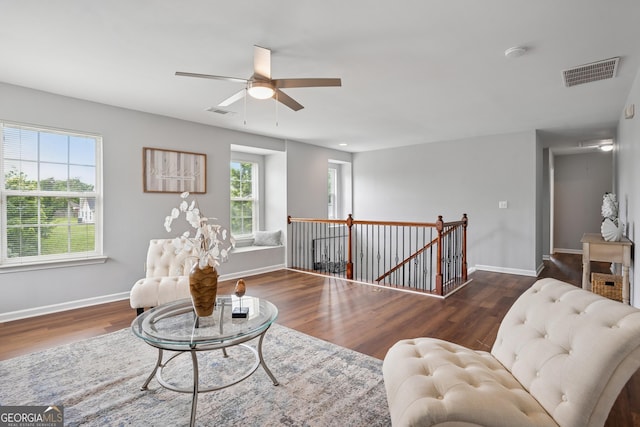 2840 Brookford Ln SW, South Fulton, GA 30331 - living area featuring an upstairs landing, ceiling fan, wood finished floors, baseboards, and attic access