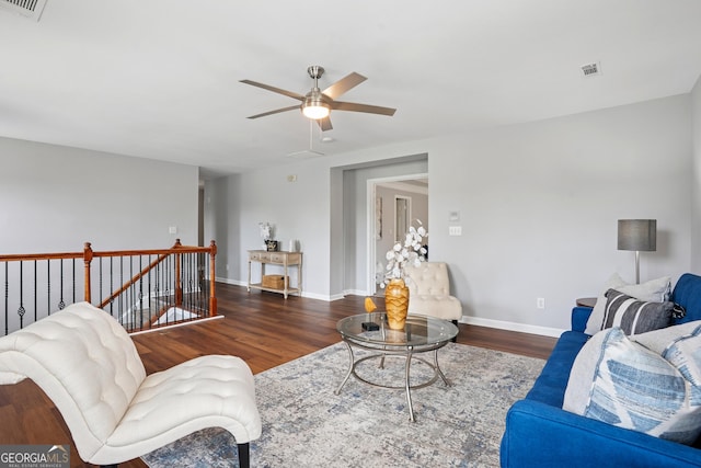 2840 Brookford Ln SW, South Fulton, GA 30331 - living room with wood finished floors, a ceiling fan, and baseboards