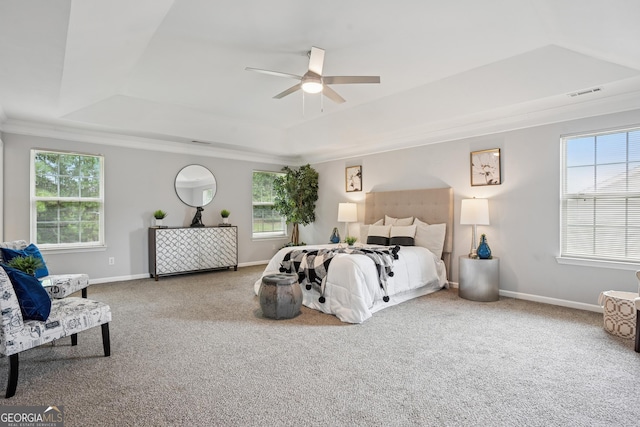 2840 Brookford Ln SW, South Fulton, GA 30331 - bedroom featuring a raised ceiling, carpet flooring, baseboards, ornamental molding, and a ceiling fan
