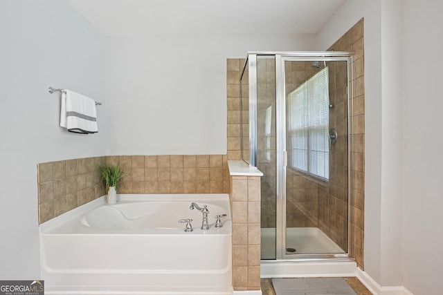 2840 Brookford Ln SW, South Fulton, GA 30331 - full bathroom featuring a garden tub and a stall shower