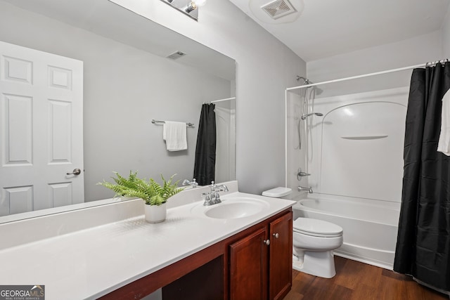 2840 Brookford Ln SW, South Fulton, GA 30331 - bathroom featuring vanity, toilet, shower / tub combo with curtain, and wood finished floors