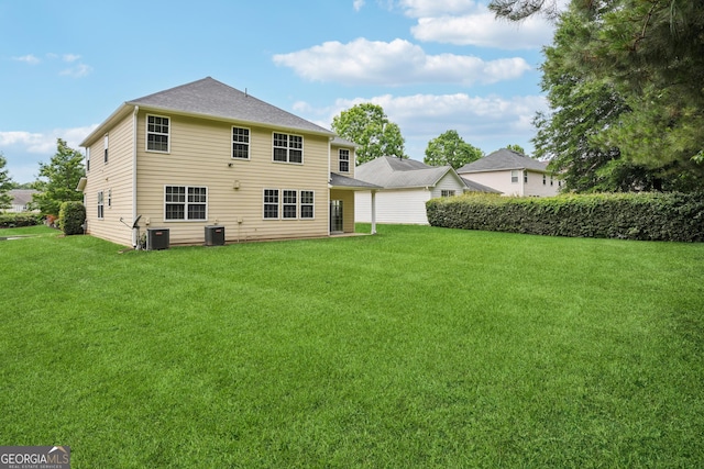 2840 Brookford Ln SW, South Fulton, GA 30331 - back of house featuring a yard and cooling unit