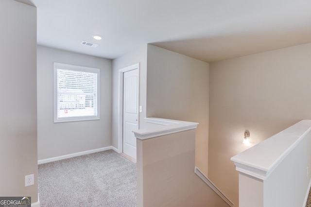 6413 River Plantation Dr, Lula, GA 30554 - hall with an upstairs landing, baseboards, and carpet floors
