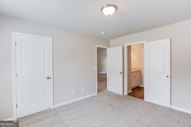 6413 River Plantation Dr, Lula, GA 30554 - unfurnished bedroom featuring carpet flooring, baseboards, and ensuite bath