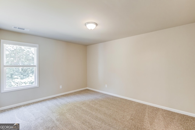 6413 River Plantation Dr, Lula, GA 30554 - spare room featuring carpet floors and baseboards