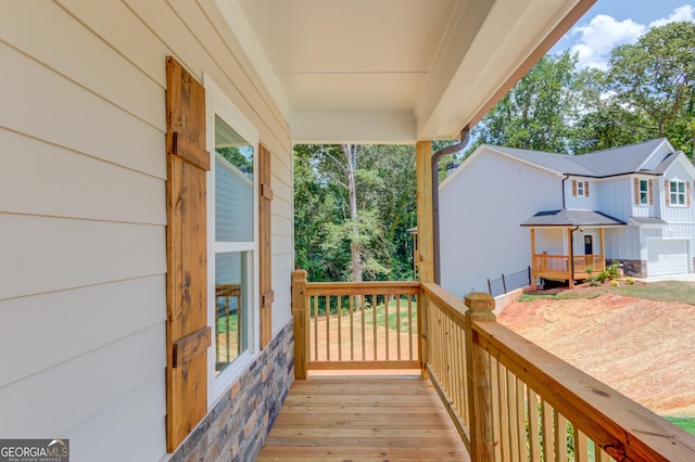 6413 River Plantation Dr, Lula, GA 30554 - deck featuring view of wooded area