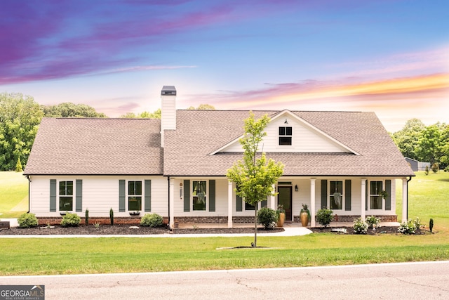 2980 Hd Atha Rd, Covington, GA 30014 - view of front facade featuring a shingled roof, a porch, and a front yard