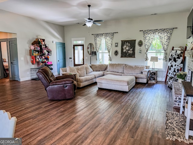 2980 Hd Atha Rd, Covington, GA 30014 - living area with wood finished floors, a ceiling fan, and a brick fireplace