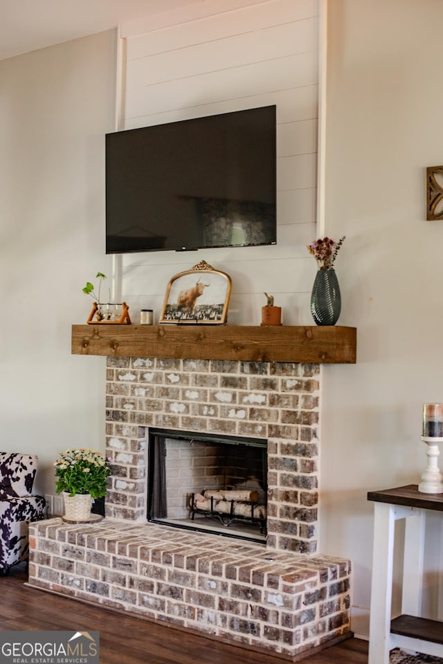 2980 Hd Atha Rd, Covington, GA 30014 - detailed view of wood finished floors and a fireplace