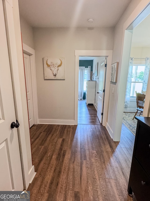 2980 Hd Atha Rd, Covington, GA 30014 - hall featuring plenty of natural light, wood finished floors, and baseboards