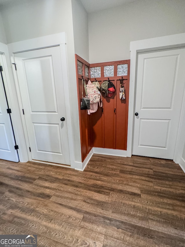 2980 Hd Atha Rd, Covington, GA 30014 - hall with dark wood finished floors and baseboards