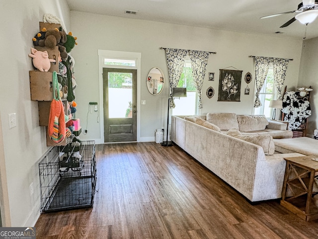 2980 Hd Atha Rd, Covington, GA 30014 - living area with wood finished floors, plenty of natural light, a ceiling fan, and baseboards