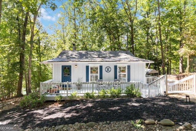 6551 Bermuda Ln, Flowery Branch, GA 30542 - view of front of property featuring a porch and board and batten siding