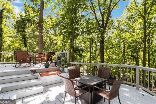 6551 Bermuda Ln, Flowery Branch, GA 30542 - deck featuring outdoor dining space