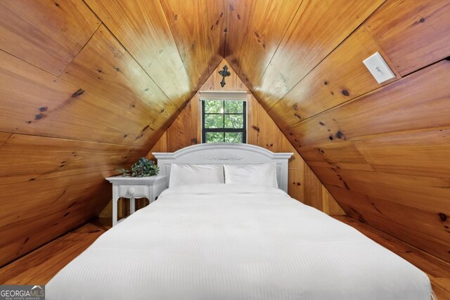 382 Highland Rd, Ellijay, GA 30540 - bedroom featuring wood finished floors, wood ceiling, lofted ceiling, and wooden walls