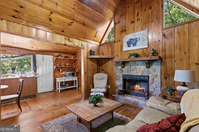 382 Highland Rd, Ellijay, GA 30540 - living area featuring wooden walls, a stone fireplace, high vaulted ceiling, wood-type flooring, and wood ceiling