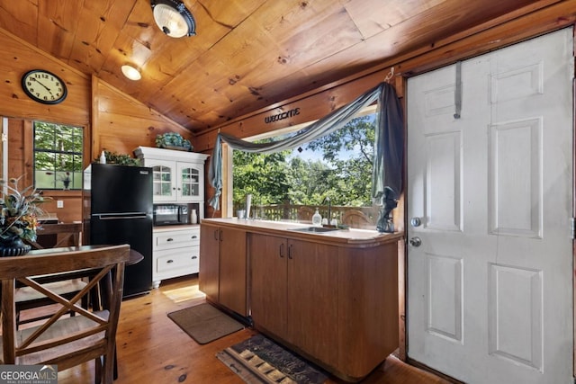 382 Highland Rd, Ellijay, GA 30540 - kitchen with black appliances, a sink, vaulted ceiling, wooden ceiling, and plenty of natural light