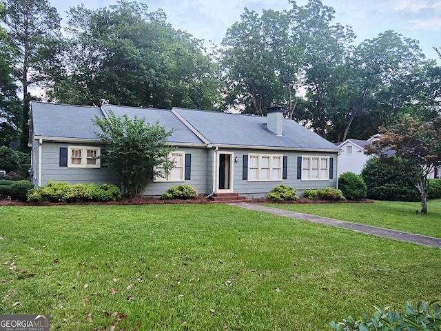 142 Griffin Dr, Carrollton, GA 30117 - single story home featuring a chimney and a front yard