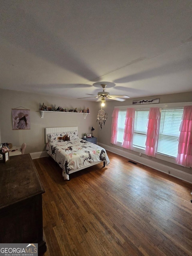 142 Griffin Dr, Carrollton, GA 30117 - bedroom with wood finished floors and ceiling fan