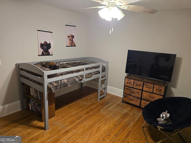 142 Griffin Dr, Carrollton, GA 30117 - bedroom with wood finished floors and ceiling fan