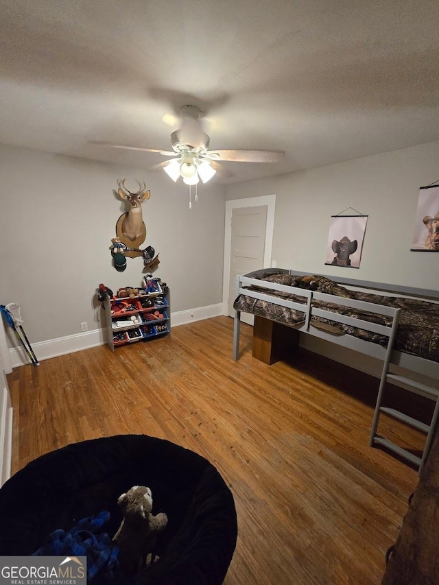 142 Griffin Dr, Carrollton, GA 30117 - recreation room with ceiling fan and wood finished floors