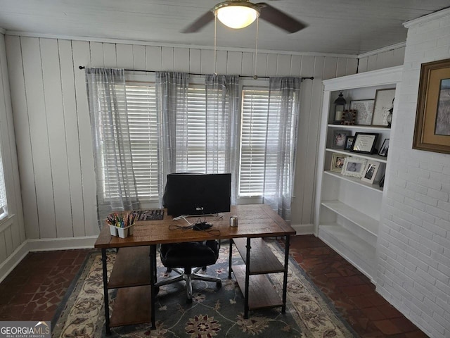 142 Griffin Dr, Carrollton, GA 30117 - office with brick flooring, a ceiling fan, wood walls, and built in features