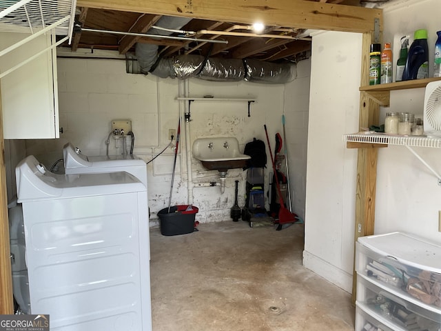 574 Lakeview Dr, Gainesville, GA 30501 - unfinished below grade area with a sink, washing machine and dryer, and concrete block wall