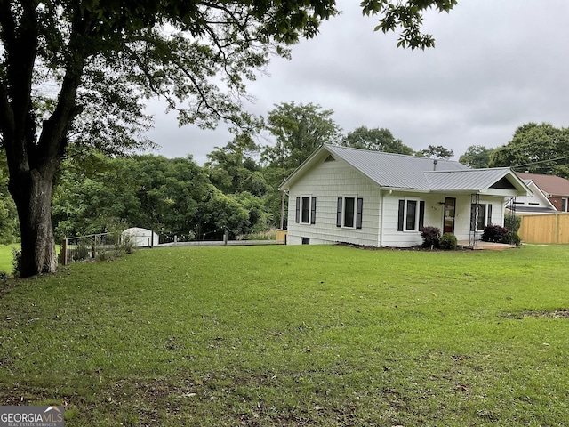 574 Lakeview Dr, Gainesville, GA 30501 - view of side of property with metal roof and covered porch