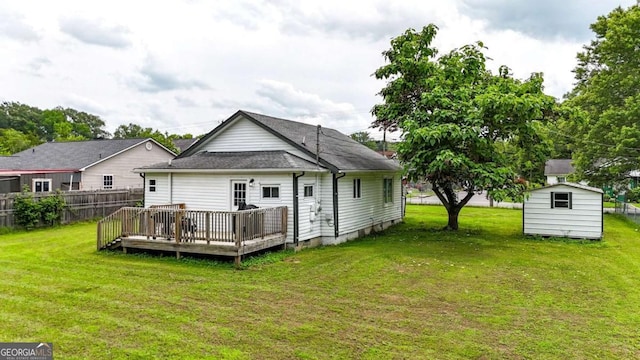 717 Morningside Dr, Dalton, GA 30721 - rear view of property with a deck and an outdoor structure