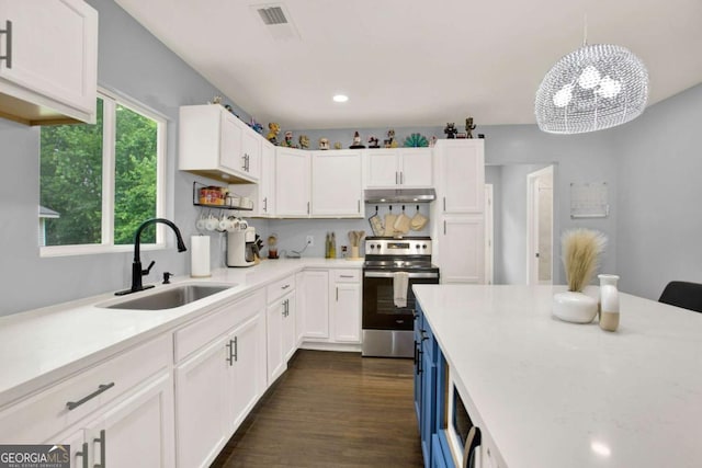 717 Morningside Dr, Dalton, GA 30721 - kitchen featuring stainless steel range with electric stovetop, under cabinet range hood, white cabinetry, light countertops, and recessed lighting
