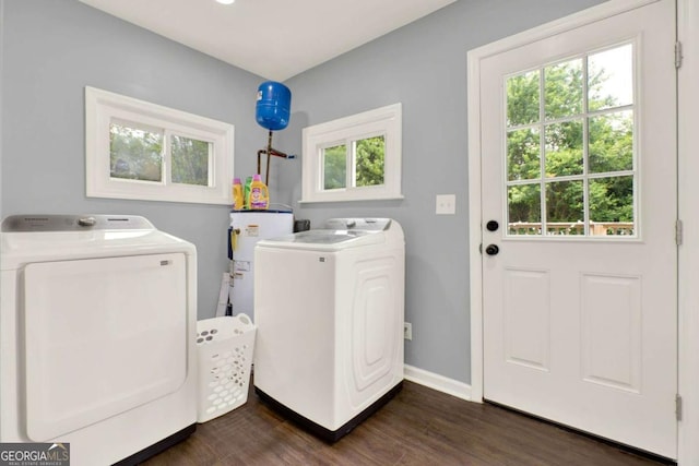 717 Morningside Dr, Dalton, GA 30721 - laundry area featuring independent washer and dryer, electric water heater, dark wood-style floors, and healthy amount of natural light