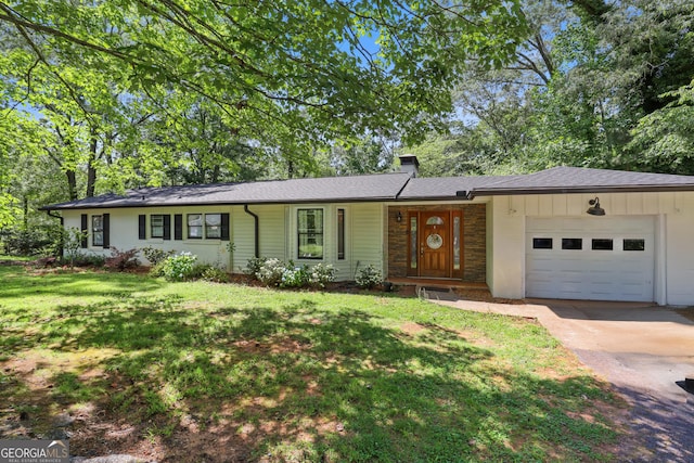 201 Georgia St, Demorest, GA 30535 - ranch-style house featuring an attached garage, a chimney, a front lawn, concrete driveway, and brick siding