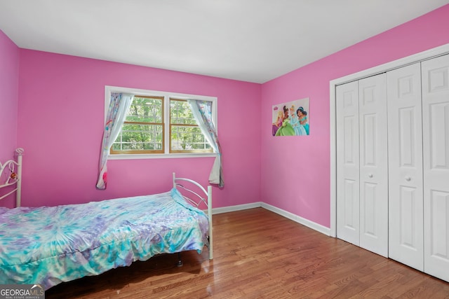 201 Georgia St, Demorest, GA 30535 - bedroom with wood finished floors, a closet, and baseboards