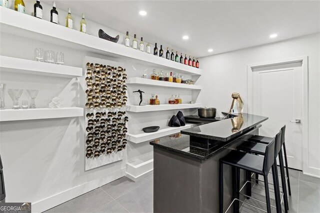 8610 Sentinae Chase Dr, Roswell, GA 30076 - bar area featuring recessed lighting and tile patterned flooring