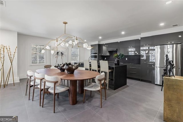 8610 Sentinae Chase Dr, Roswell, GA 30076 - dining area with recessed lighting, light tile patterned flooring, and a chandelier