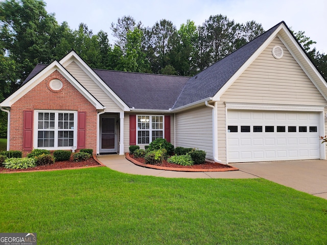 198 Lake Cv, Approach, Newnan, GA 30265 - ranch-style house featuring driveway, a front yard, a garage, a shingled roof, and brick siding